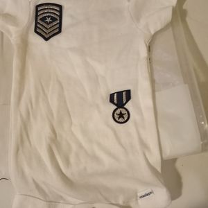 Brand new onies white with blue patches for boy 6 to 9 months